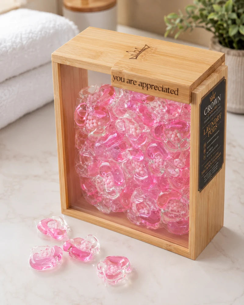 Cherry Blossom laundry pods in the Crown Standard reusable bamboo container